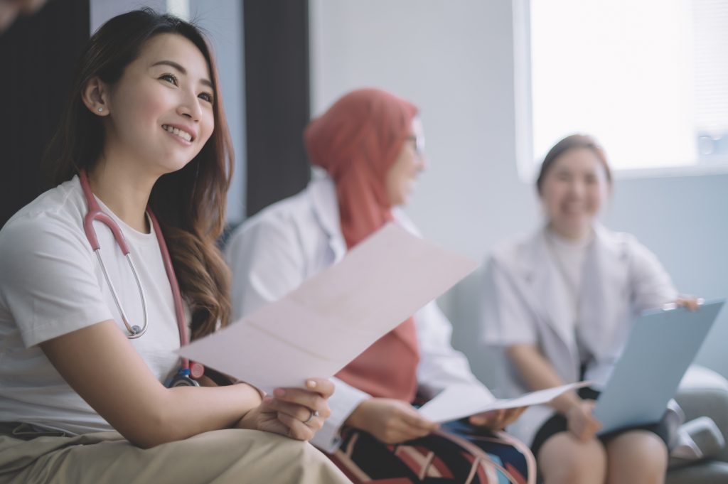 Doctors discussing medical invoices